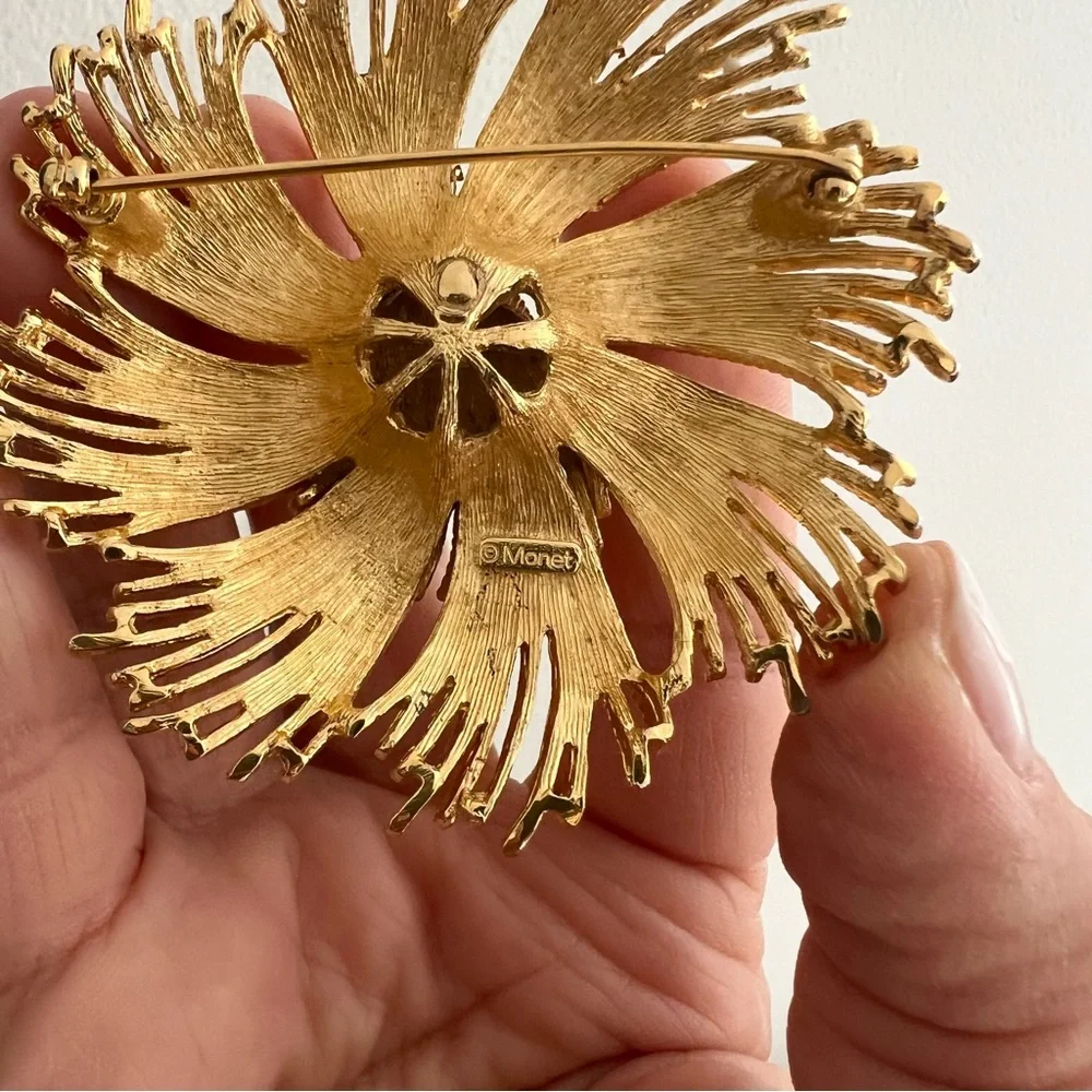 Vintage Monet pin from 1960’s with some patina on the metal - lovely for…